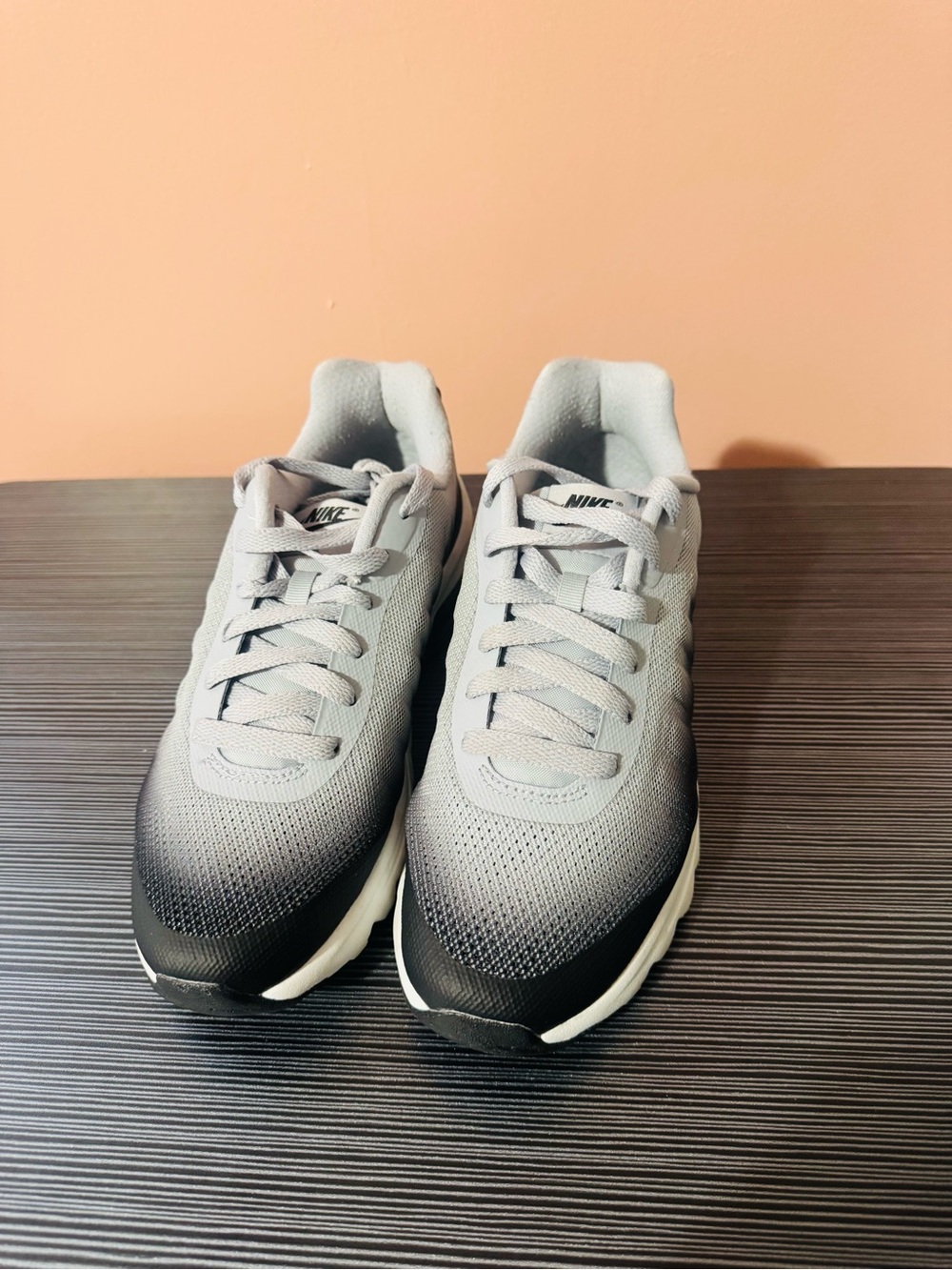 Nike women’s Light Gray to Black Gradient Sneakers